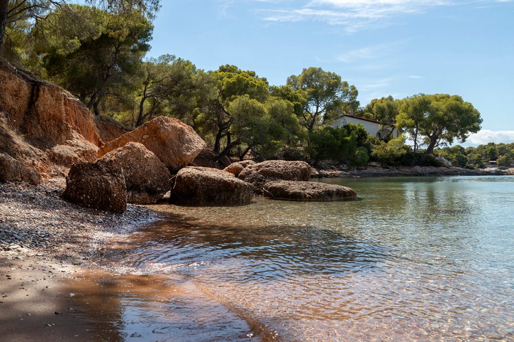 Exploring the 12 Most Outstanding Beaches in Spetses - Tia Does Travel