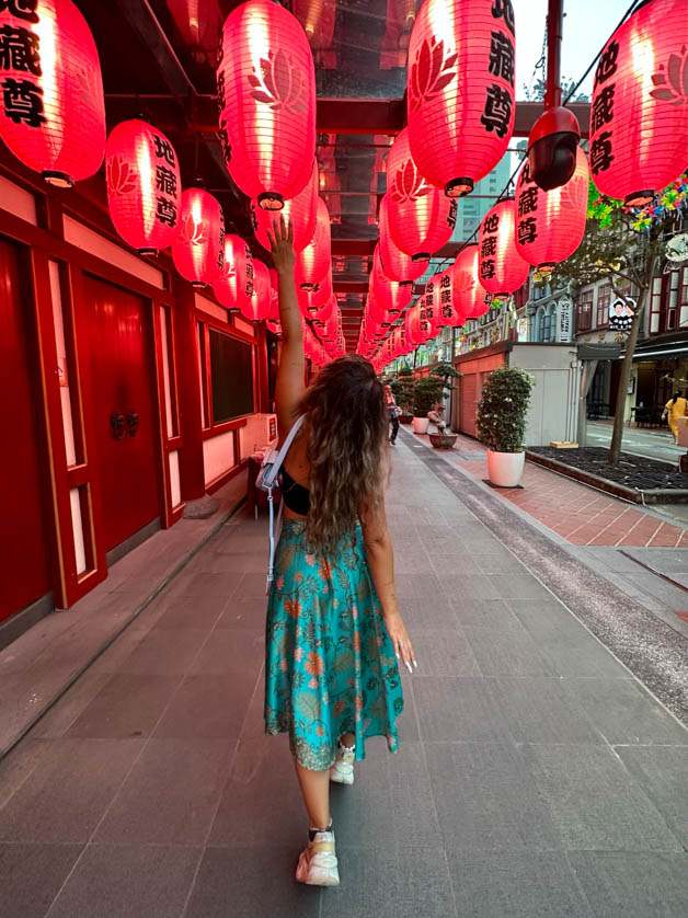 me walking alongside hundreds of lanterns in Chinatown - a must in your Itinerary for Singapore 3 days